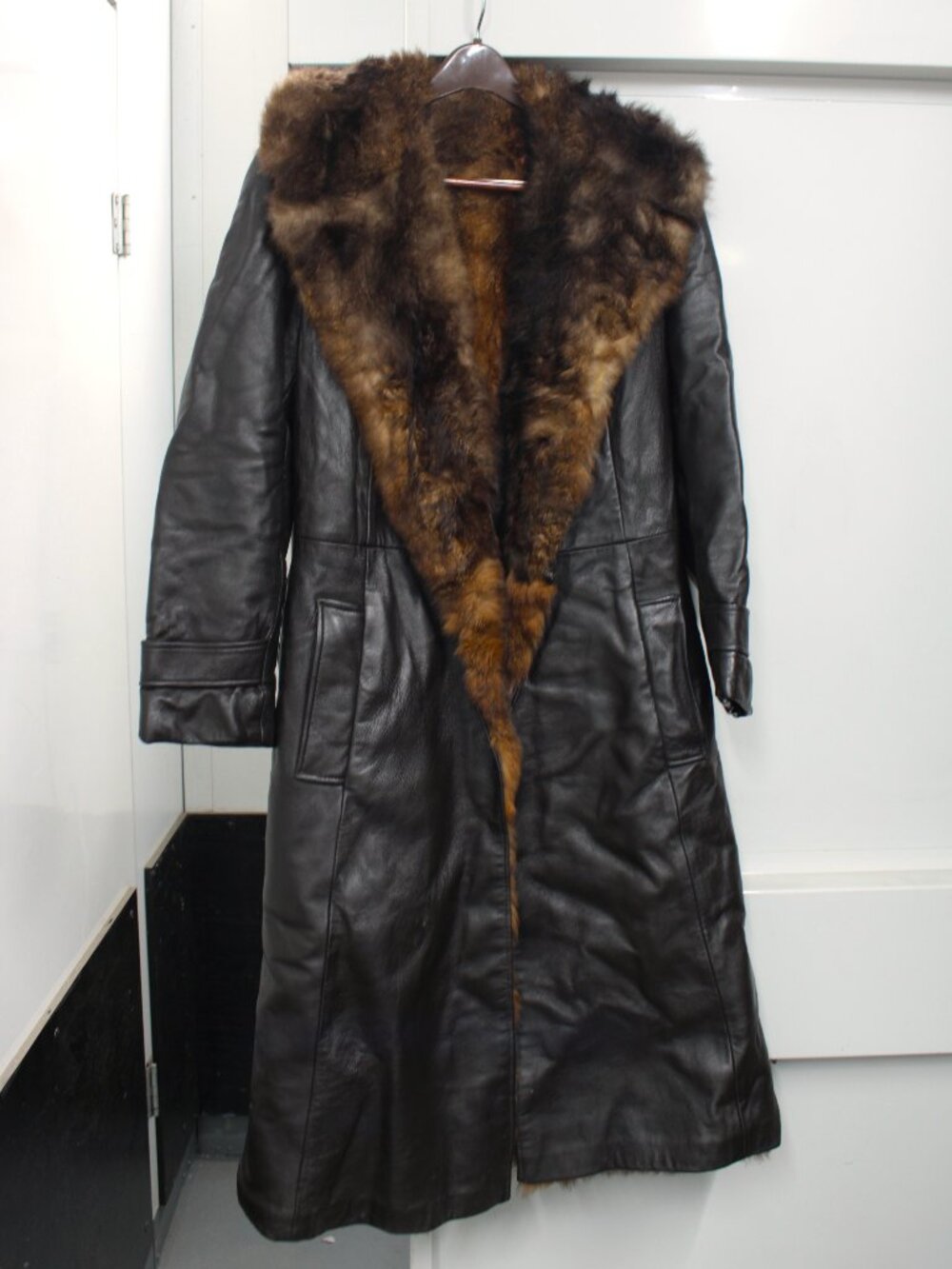 Vintage brown leather belted coat lined in real fur